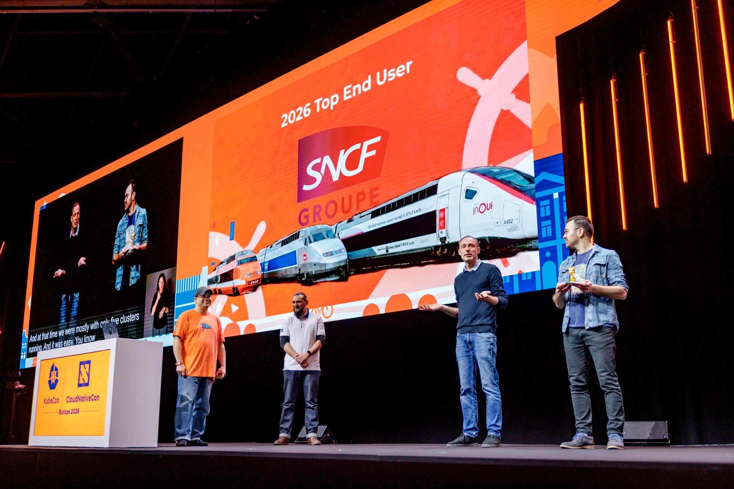 SNCF Groupe representatives accepting the 2026 Top End User Award on the KubeCon + CloudNativeCon keynote stage